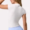 Soft Active-top met kwartritssluiting in Milk