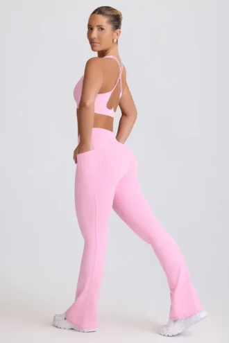 Soft Active V-taille legging met zakken en uitlopende pijpen in babyroze