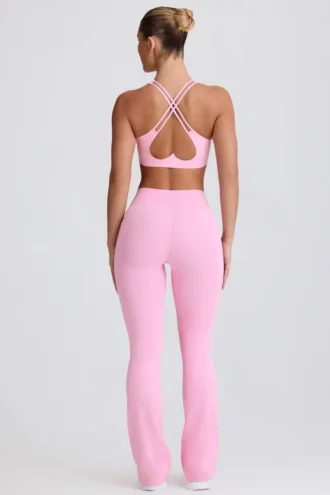 Soft Active V-taille legging met zakken en uitlopende pijpen in babyroze