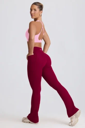 Soft Active V-taille legging met zakken en uitlopende pijpen in bordeaux