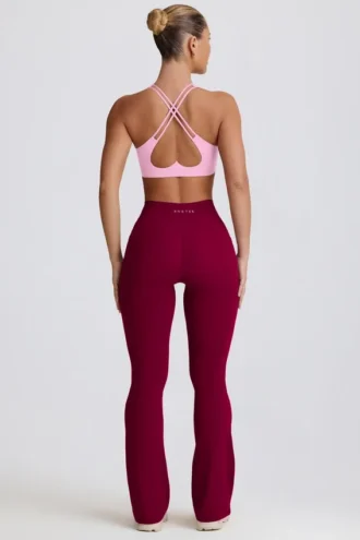 Soft Active V-taille legging met zakken en uitlopende pijpen in bordeaux