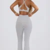 Soft Active V-taille legging met zakken en uitlopende pijpen in grijs