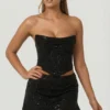 Sterling versierde gedrapeerde corsettop in zwart
