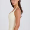Stretch katoenen jersey body met gelaagde kruisrug in crème