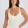 Stretch katoenen jersey body met gelaagde kruisrug in crème