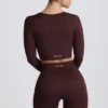 Super Sculpt naadloze cropped top met lange mouwen in chocoladebruin