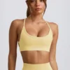Super Sculpt naadloze rugloze sportbeha in botergeel