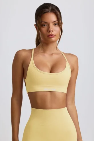 Super Sculpt naadloze rugloze sportbeha in botergeel