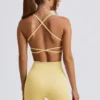 Super Sculpt naadloze rugloze sportbeha in botergeel