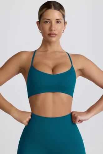 Super Sculpt naadloze sportbeha met gekruiste bandjes in blauwgroen