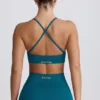 Super Sculpt naadloze sportbeha met gekruiste bandjes in blauwgroen