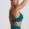 Super Sculpt naadloze sportbeha met gekruiste bandjes in blauwgroen