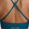 Super Sculpt naadloze sportbeha met gekruiste bandjes in blauwgroen