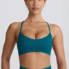 Super Sculpt naadloze sportbeha met gekruiste bandjes in blauwgroen