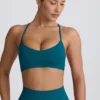 Super Sculpt naadloze sportbeha met gekruiste bandjes in blauwgroen