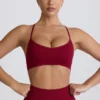 Super Sculpt naadloze sportbeha met gekruiste bandjes in bordeauxrood