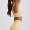 Super Sculpt naadloze sportbeha met gekruiste bandjes in botergeel