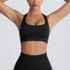 Super Sculpt naadloze sportbeha met T-rug in zwart
