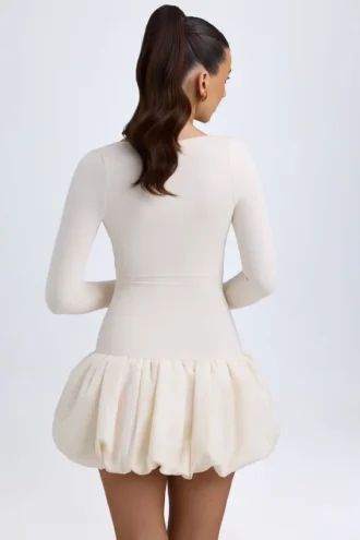 Tallou Modal minijurk met verlaagde taille en bubbelzoom in ivoor