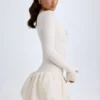 Tallou Modal minijurk met verlaagde taille en bubbelzoom in ivoor