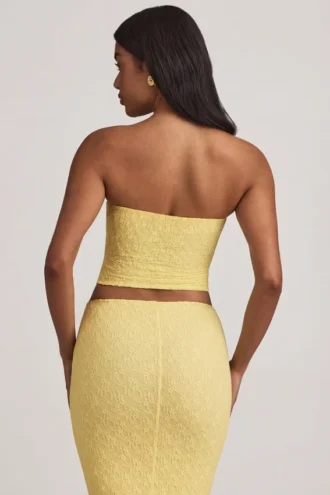 Tamia gerimpelde strapless kanten top in pastelgeel