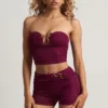 Tarni bandeau crop top met hardware-details in bessenpaars