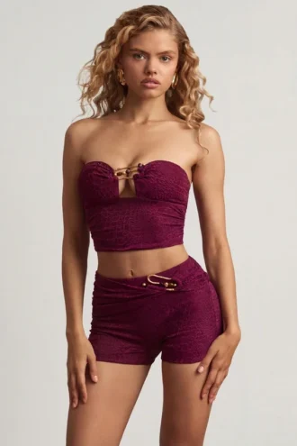 Tarni bandeau crop top met hardware-details in bessenpaars