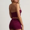 Tarni bandeau crop top met hardware-details in bessenpaars