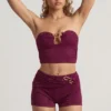 Tarni bandeau crop top met hardware-details in bessenpaars