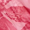 Taveuni maxi-jurk met col en metalen details in roze orchideeënprint