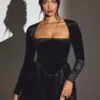 Tera fluwelen mini-corsetjurk met lange mouwen in gitzwart