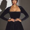 Tera fluwelen mini-corsetjurk met lange mouwen in gitzwart
