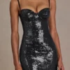 Theodora Premium minijurk met paillettenkant in zwart