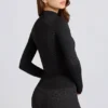 Thermische top met lange mouwen in zwart luipaardprint