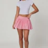 Thia mini-rok met strikdetail en broderie anglaise in zachtroze