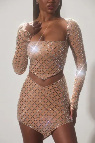 Thora versierde asymmetrische crop top in amandel