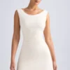 Tigen minijurk met schouderloze halslijn en A-lijn in ivoor