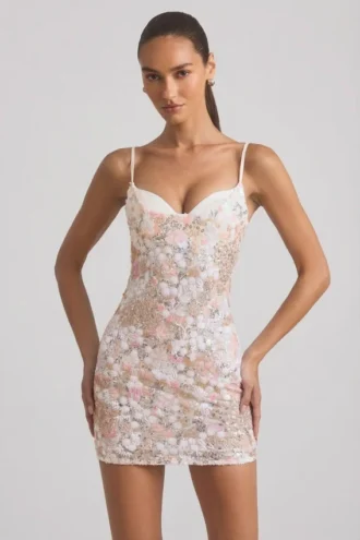 Velena minijurk met versierde camisole en strakke pasvorm in ivoor