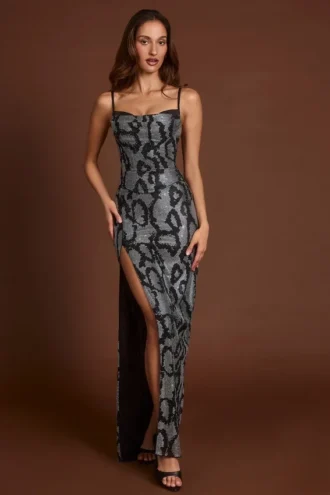 Velia versierde Peekaboo-jurk met col in zilveren slangenprint