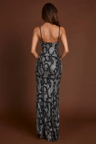 Velia versierde Peekaboo-jurk met col in zilveren slangenprint