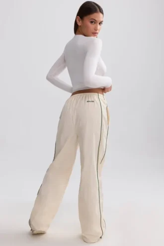 Waterafstotende joggingbroek met wijde pijpen in marmer