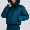 Waterdicht cropped ski-jack met capuchon van imitatiebont in teal