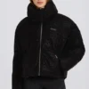 Waterdichte cropped oversized ski-jas in zwart met luipaardprint