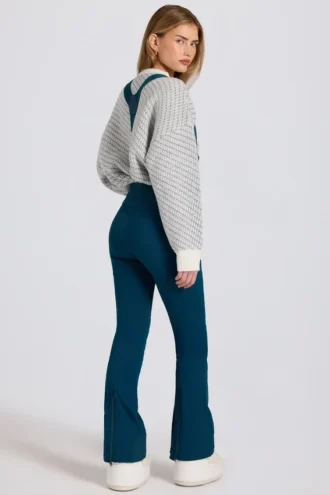 Waterdichte salopette met hoge taille en bretels in blauwgroen