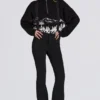 Waterdichte salopette met hoge taille en bretels in zwart