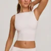 Wren crop top met hoge hals en open rug in wit