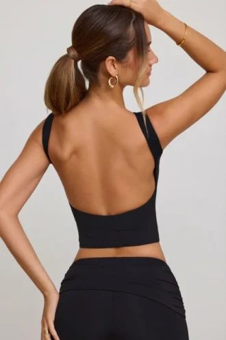 Wren crop top met hoge hals en open rug in zwart