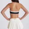 Zachte, actieve tennisrok met lage taille en plooien in ivoorkleur
