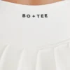 Zachte, actieve tennisrok met lage taille en plooien in ivoorkleur
