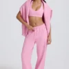 Zachte katoenen jersey joggingbroek met middelhoge taille en wijde pijpen in babyroze
